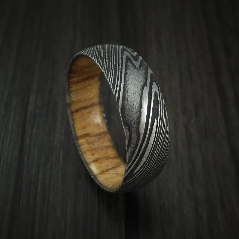 Kuro Damascus Steel Men's Ring with Zebra Wood Hardwood Sleeve Custom Made Wood Band