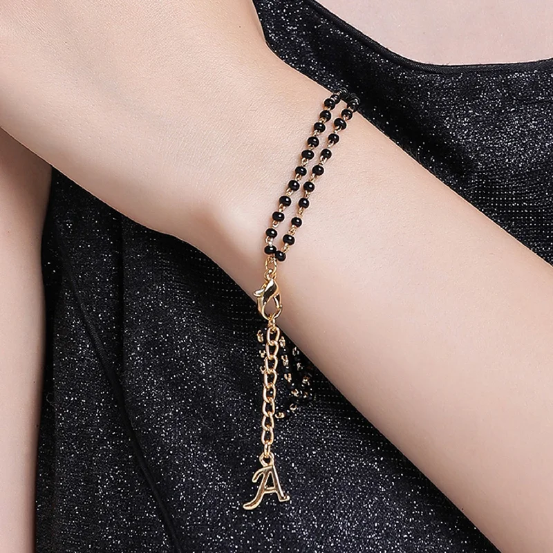 Delicate filigree bangles-Estele Gold Plated Stylish & Trendy Lightweight "A" Initial Mangalsutra Charm Bracelet with Black Beads for Women