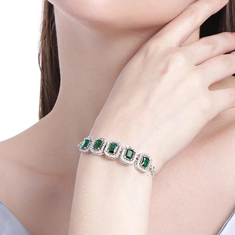 Soft cord bracelets-Estele Rhodium Plated CZ Ossum Octagon Bracelet With Emerald Crystals for Women